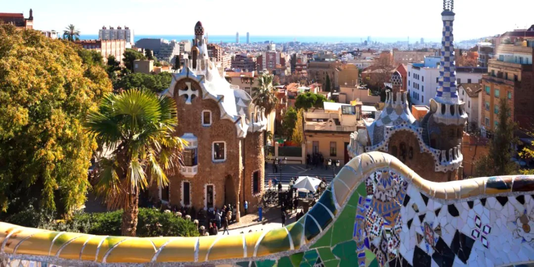 panoramic view barcelona multiple building roofs view from Park Güell Spain